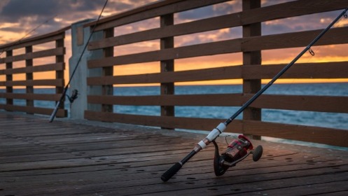 Fishing From The Dock | Island Real Estate