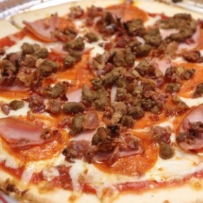 meat pizza from Michaelangelos | Island Real Estate
