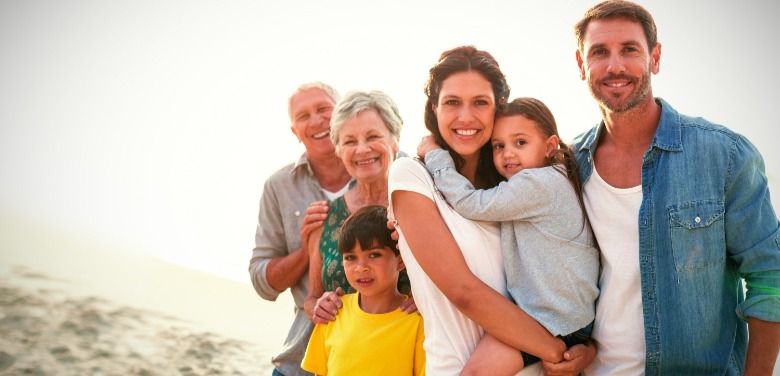 family on topsail beach | Island Real Estate