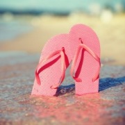 flip flops on the beach | Island Real Estate