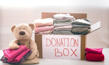 donattion box to  local charity | Island Real Estate