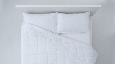 white simple bedding | Island Real Estate