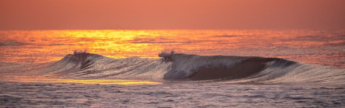 untitled-0254 | Island Real Estate breaking waves at sunset